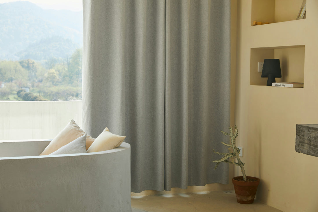 How to Use Curtains and Blinds to Make Rooms Feel Larger