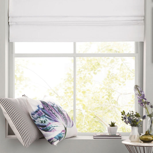 Embrace Winter Comfort with 100% Blackout Roman Blinds: Your Year-Round Insulation Solution